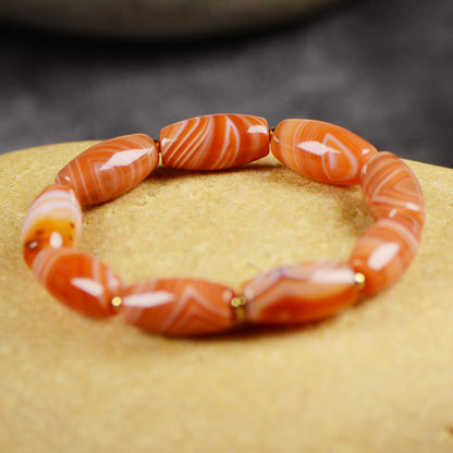 Vajra Salmon-Hued Striated Agate Bracelet